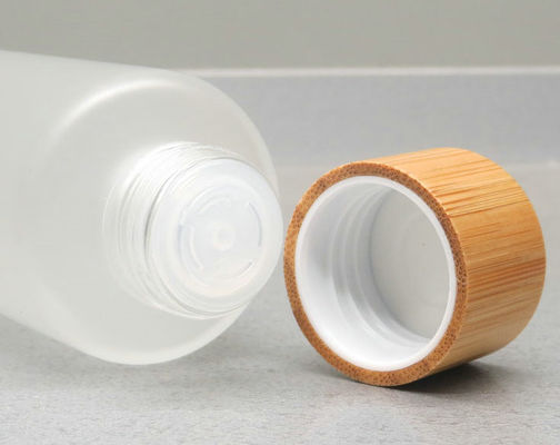 150ml ha glassato la bottiglia di vetro della pelle cosmetica di bambù di cura della pompa del contenitore della lozione