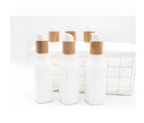 Contenitore cosmetico liscio della lozione della bottiglia di vetro di OPL e barattolo crema con il coperchio di legno