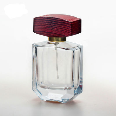 bottiglia di profumo del vetro trasparente 50ml con i cappucci di legno del collarwith dello spruzzo della pompa e del cappuccio