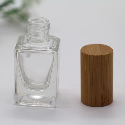 il cappuccio di bambù della bottiglia quadrata dello smalto compone la bottiglia vuota cosmetica della bottiglia di vetro