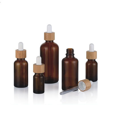 1oz svuotano le bottiglie del contagoccia di Amber Black Essential Oil Glass con i coperchi di bambù