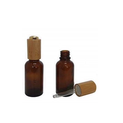 Bottiglia di olio essenziale di vetro con il contenitore di bambù di contagoccia resistente di bambù del bambino