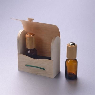 Bottiglia di olio essenziale di vetro con il contenitore di bambù di contagoccia resistente di bambù del bambino