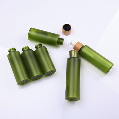 Imballaggio cosmetico di bambù dello skincare amichevole di Eco con la bottiglia verde dell'ANIMALE DOMESTICO