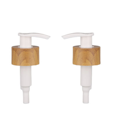 Pompa cosmetica della bottiglia della crema della lozione della pompa del gel del metallo di rivestimento del bambù del doppio strato 28/410