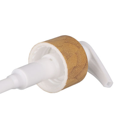 Pompa cosmetica della bottiglia della crema della lozione della pompa del gel del metallo di rivestimento del bambù del doppio strato 28/410