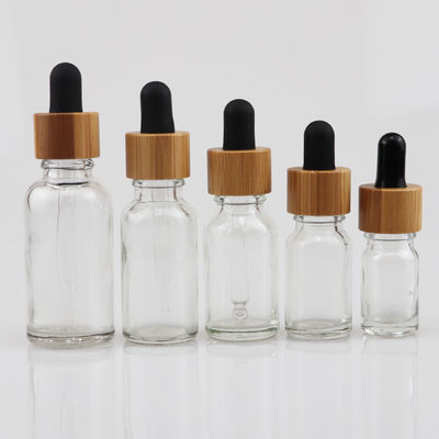bottiglia cosmetica di vetro dell'olio essenziale 100ml con la pelle di bambù Brown di cura del contagoccia