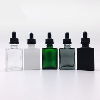 Bottiglia di vetro cosmetica del contagoccia 30ml di rettangolo con il cappuccio di bambù per olio essenziale
