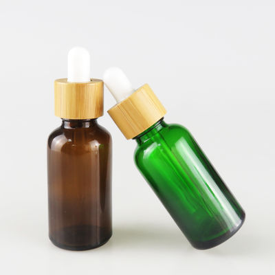 Bottiglia di olio essenziale di vetro con la piccola bottiglia di olio del contagoccia resistente di bambù del bambino