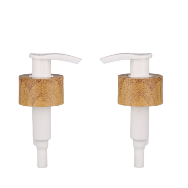 Pompa cosmetica della bottiglia della crema della lozione della pompa del gel del metallo di rivestimento del bambù del doppio strato 28/410